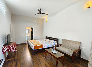 Economy Double Room – Hornbill Castle Homestay Valparai Simple and clean double room Hornbill Castle